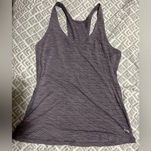 💰2/$10 used under Armour purple razor back tank - size n/a(m/l)